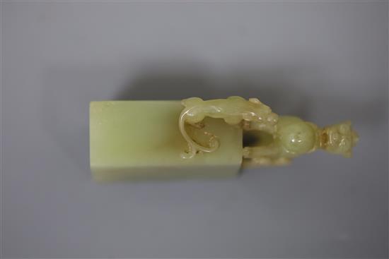 A Chinese greenish-yellow jade seal, 19th/20th century, H. 7.5cm